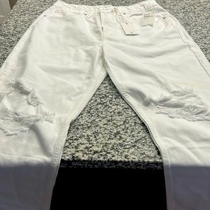 Good American straight leg jeans. Size 10/30. White minimum distressed.
